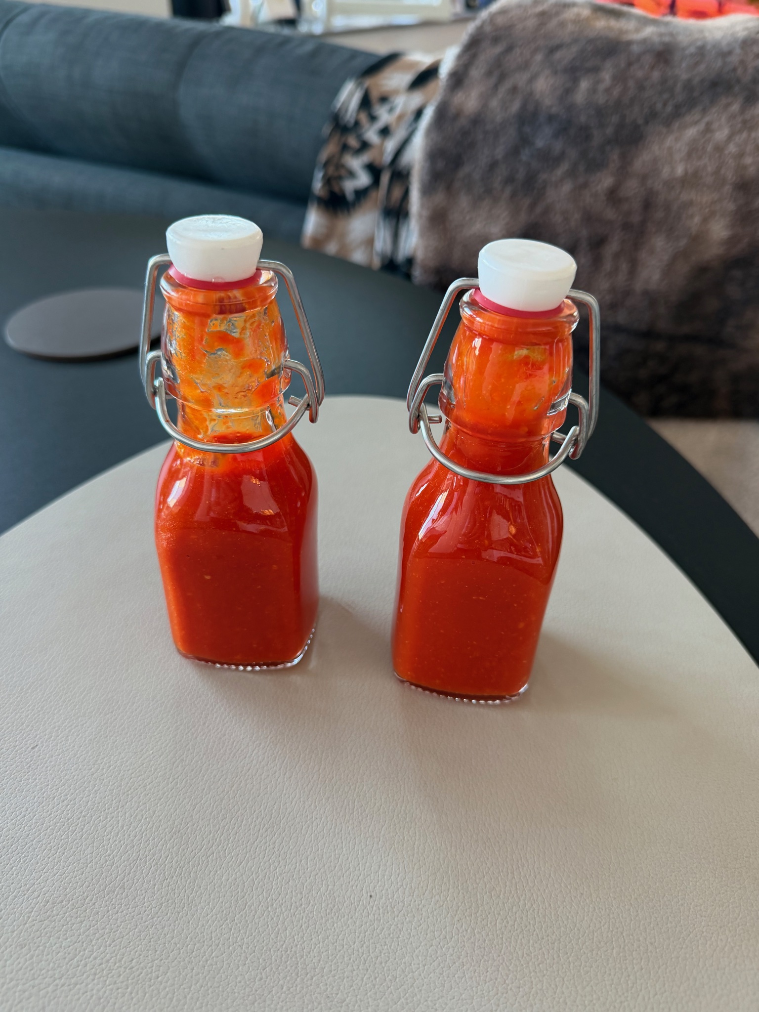 Two bottles of spicy homemade hot sauce Two bottles of spicy homemade hot sauce